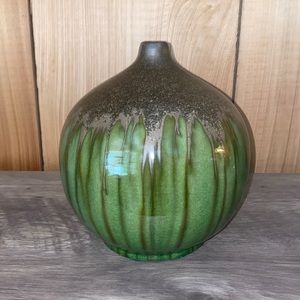 Green and brown circular vase